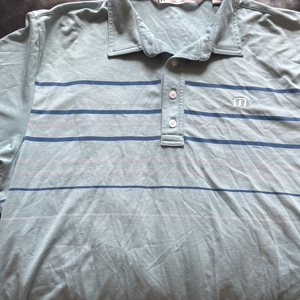 Travis Mathew Light Blue Polo with Stripes